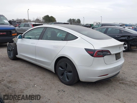 2020 Tesla Model 3 Standard Range Plus with VIN 5YJ3E1EA1LF799766, listed as a IAAI auction lot 41386508 with 90,000 mi miles. Bid and sale history available at carsss.com. Image 3.