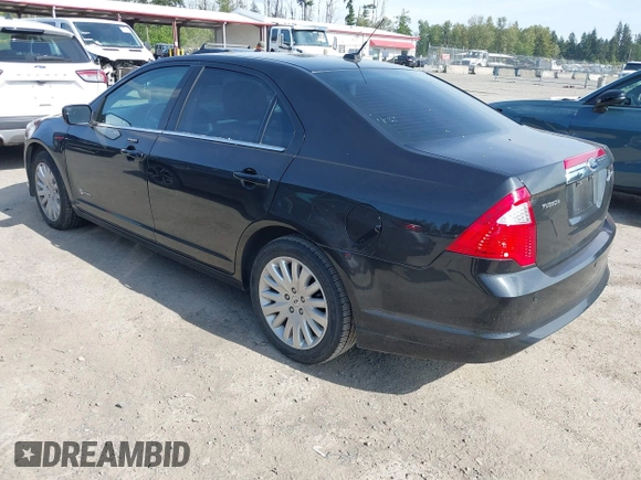 2012 Ford Fusion Hybrid z VIN 3FADP0L31CR380821, wystawiony jako IAAI lot #42332256 z przebiegiem 59 431 mil mil oraz . Historia ofert i sprzedaży dostępna na DreamBid. Obrazek 3.