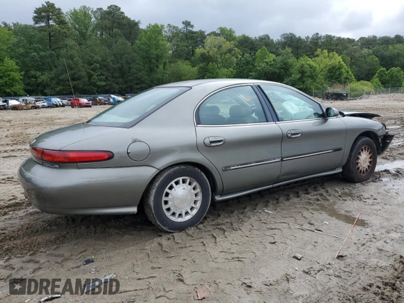 1999 Mercury Sable LS with VIN 1MEFM53U6XG646248, listed as a Copart auction lot 57859405 with 128,286 mi miles and Salvage title. Bid and sale history available at DreamBid. Image 3.