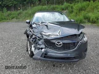 2015 Mazda CX-5 Sport with VIN JM3KE4BYXF0511249, listed as a Copart auction lot 63310695 with 208,615 mi miles and Salvage title. Bid and sale history available at DreamBid. Image 5.