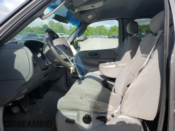 2003 Ford F-150 XL with VIN 2FTRX18L73CA49989, listed as a Copart auction lot 57434025 with 141,876 mi miles and Salvage title. Bid and sale history available at DreamBid. Image 7.