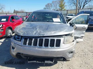 2014 Jeep Grand Cherokee Laredo with VIN 1C4RJFAG0EC289647, listed as a IAAI auction lot 41883914 with 176,501 mi miles and . Bid and sale history available at DreamBid. Image 12.