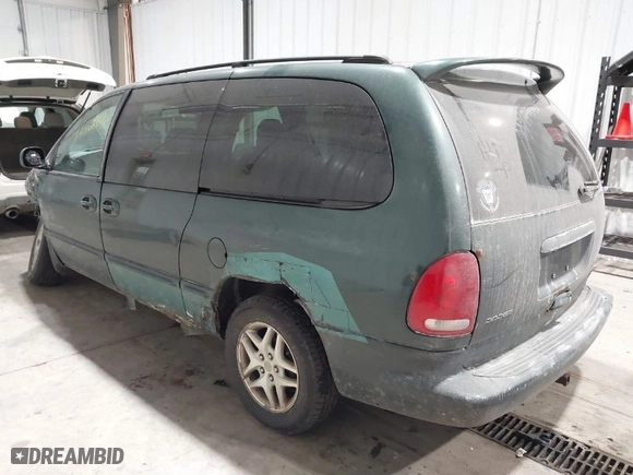1999 Dodge Caravan SE with VIN 2B4GP44G0XR318805, listed as a IAAI auction lot 41521636 with 213,212 mi miles. Bid and sale history available at carsss.com. Image 3.