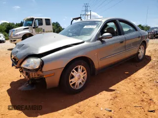 2004 Mercury Sable LS Premium z VIN 1MEHM55S74A621569, wystawiony jako Copart lot #58057525 z przebiegiem Nie podano mil oraz Szkoda całkowita • Salvage title. Historia ofert i sprzedaży dostępna na DreamBid. Obrazek 1.