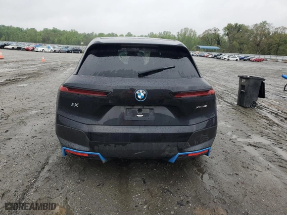 2023 BMW iX xDrive50 with VIN WB523CF00PCL83127, listed as a Copart auction lot 49927914 with 0 mi miles. Bid and sale history available at carsss.com. Image 6.