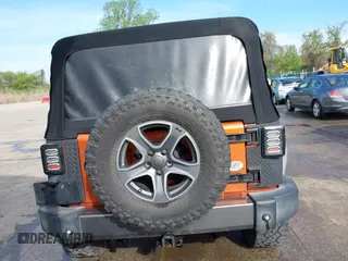2010 Jeep Wrangler Unlimited Sport with VIN 1J4HA3H1XAL189667, listed as a IAAI auction lot 42062351 with 144,838 mi miles. Bid and sale history available at carsss.com. Image 16.