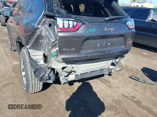 2019 Jeep Cherokee Trailhawk with VIN 1C4PJMBX6KD410391, listed as a IAAI auction lot 41821355 with 79,473 mi miles and . Bid and sale history available at DreamBid. Image 6.