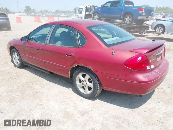 2003 Ford Taurus SE Standard with VIN 1FAFP53UX3G124702, listed as a IAAI auction lot 42463606 with 129,874 mi miles and . Bid and sale history available at DreamBid. Image 3.