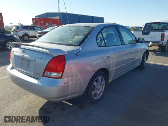 2003 Hyundai Elantra GLS z VIN KMHDN45D63U553542, wystawiony jako IAAI lot #42032294 z przebiegiem 164 210 mil mil oraz . Historia ofert i sprzedaży dostępna na DreamBid. Obrazek 4.