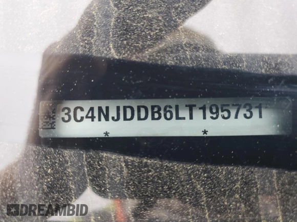 2020 Jeep Compass Trailhawk with VIN 3C4NJDDB6LT195731, listed as a Copart auction lot 50948035 with 80,195 mi miles and Salvage title. Bid and sale history available at DreamBid. Image 14.