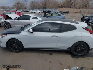 2019 Hyundai Veloster Turbo with VIN KMHTH6AB3KU020193, listed as a IAAI auction lot 41526722 with 54,697 mi miles. Bid and sale history available at carsss.com. Image 14.