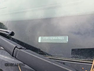 2021 Ford Transit Cargo z VIN 1FTBR1Y82MKA76523, wystawiony jako IAAI lot #42731352 z przebiegiem 39 449 mil mil oraz . Historia ofert i sprzedaży dostępna na DreamBid. Obrazek 1.