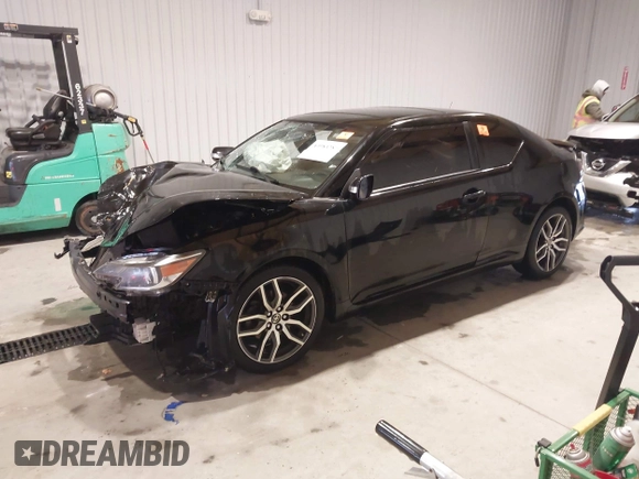 2014 Scion tC z VIN JTKJF5C74E3086243, wystawiony jako IAAI lot #40983287 z przebiegiem Nie podano mil oraz . Historia ofert i sprzedaży dostępna na DreamBid. Obrazek 18.