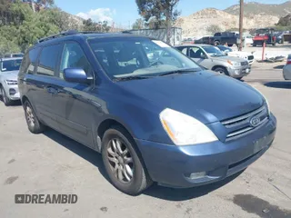 2007 Kia Sedona EX with VIN KNDMB233176164703, listed as a IAAI auction lot 41970003 with 165,479 mi miles. Bid and sale history available at carsss.com. Image 1.