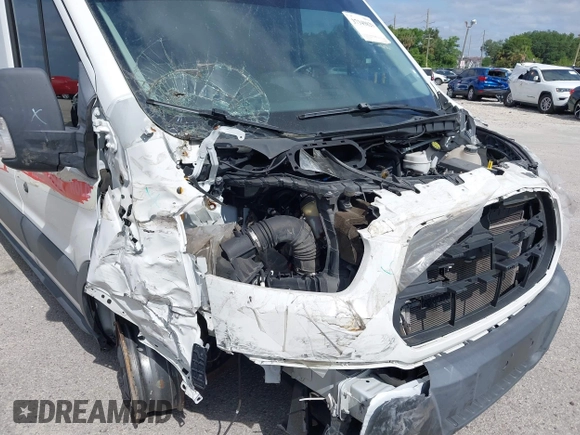 2017 Ford Transit z VIN 1FTYE2CG6HKB46718, wystawiony jako IAAI lot #37349829 z przebiegiem 94 836 mil mil oraz . Historia ofert i sprzedaży dostępna na DreamBid. Obrazek 6.