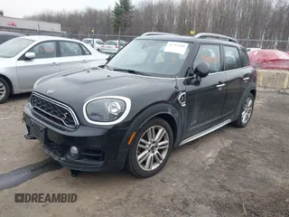 2019 MINI Countryman Cooper S with VIN WMZYT5C58K3J87679, listed as a IAAI auction lot 41711500 with 74,433 mi miles. Bid and sale history available at carsss.com. Image 2.