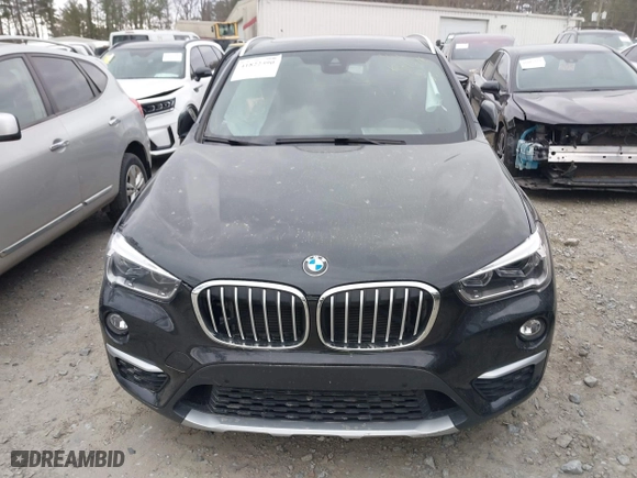 2018 BMW X1 xDrive28i with VIN WBXHT3C34J5K21576, listed as a IAAI auction lot 41822390 with 69,645 mi miles. Bid and sale history available at carsss.com. Image 12.