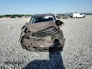2011 MINI Countryman with VIN WMWZB3C53BWM00724, listed as a Copart auction lot 52293575 with Not Provided miles and Salvage Title. Bid and sale history available at DreamBid. Image 11.
