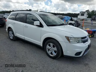 2012 Dodge Journey SXT with VIN 3C4PDCBG5CT135724, listed as a Copart auction lot 56938415 with 180,548 mi miles and Salvage title. Bid and sale history available at DreamBid. Image 4.