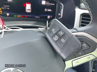 2022 Volkswagen Atlas SE z VIN 1V2JR2CA7NC523045, wystawiony jako IAAI lot #42072173 z przebiegiem 49 943 mil mil oraz . Historia ofert i sprzedaży dostępna na DreamBid. Obrazek 11.