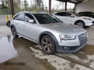 2013 Audi allroad Premium Plus with VIN WA1UFAFL0DA184311, listed as a IAAI auction lot 41976884 with 114,656 mi miles. Bid and sale history available at carsss.com. Image 1.
