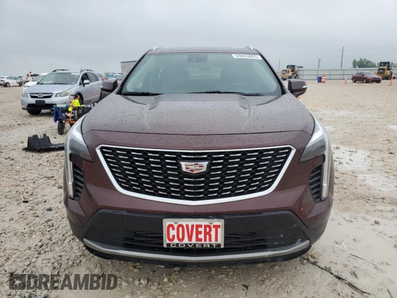2023 Cadillac XT4 FWD Premium Luxury with VIN 1GYFZCR48PF100078, listed as a Copart auction lot 55955865 with 23,509 mi miles and Salvage title. Bid and sale history available at DreamBid. Image 5.