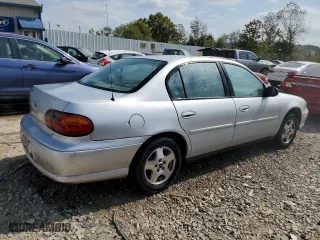 2003 Chevrolet Malibu with VIN 1G1ND52J53M700194, listed as a Copart auction lot 72454574 with 136,497 mi miles and Salvage Title. Bid and sale history available at carsss.com. Image 3.