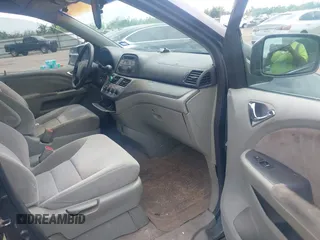 2006 Honda Odyssey LX with VIN 5FNRL38206B120381, listed as a IAAI auction lot 42058872 with 165,217 mi miles. Bid and sale history available at carsss.com. Image 5.