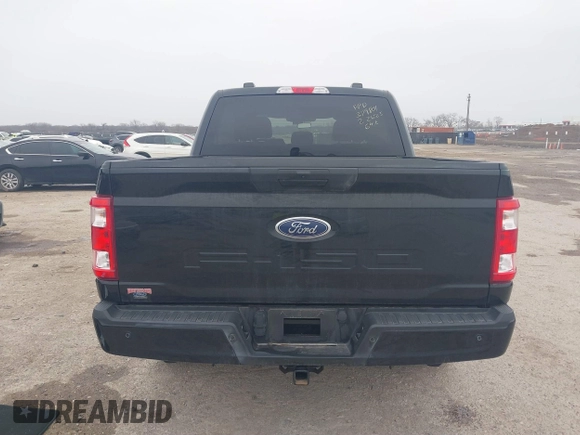 2023 Ford F-150 XL with VIN 1FTEW1C55PKD01184, listed as a IAAI auction lot 41700658 with 18,804 mi miles. Bid and sale history available at carsss.com. Image 16.