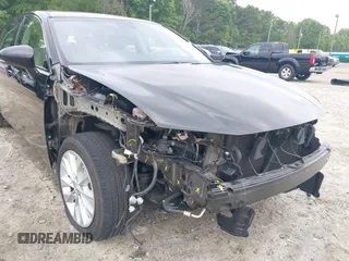 2014 Lexus ES 300h with VIN JTHBW1GGXE2074004, listed as a IAAI auction lot 42206490 with 79,725 mi miles and . Bid and sale history available at DreamBid. Image 6.