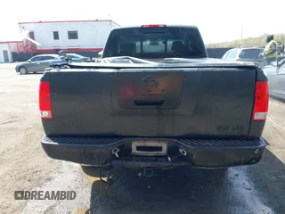 2005 Nissan Titan XE with VIN 1N6BA06A35N569289, listed as a IAAI auction lot 41985387 with 227,117 mi miles. Bid and sale history available at carsss.com. Image 16.