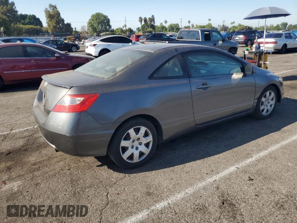 2010 Honda Civic Cpe LX with VIN 2HGFG1B61AH529839, listed as a Copart auction lot 69501724 with 218,443 mi miles and Salvage Title. Bid and sale history available at carsss.com. Image 3.