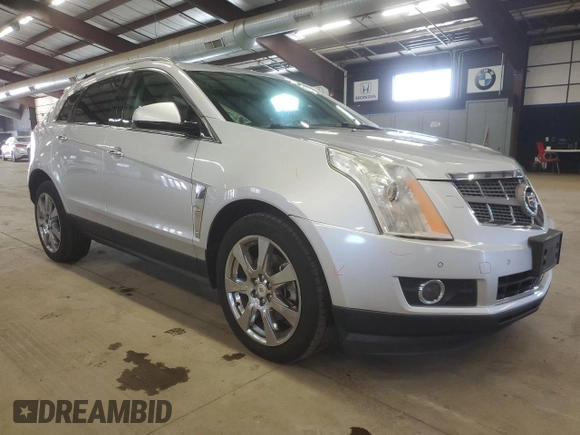 2011 Cadillac SRX Turbo Premium Collection with VIN 3GYFNKE65BS530734, listed as a Copart auction lot 51289145 with 121,879 mi miles and Salvage title. Bid and sale history available at DreamBid. Image 4.