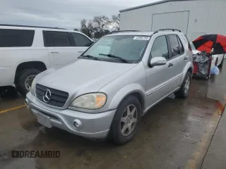 2003 Mercedes-Benz M-Class 3.7L with VIN 4JGAB57E43A410484, listed as a Copart auction lot 43966195 with 122,957 mi miles and Salvage Title. Bid and sale history available at carsss.com. Image 1.