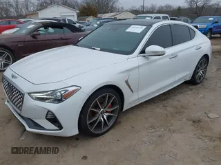 2020 Genesis G70 3.3T with VIN KMTG34LEXLU060919, listed as a IAAI auction lot 41619579 with 69,859 mi miles. Bid and sale history available at carsss.com. Image 2.