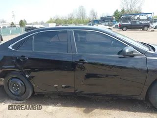 2016 Toyota Camry XLE with VIN 4T4BF1FK0GR581297, listed as a IAAI auction lot 42059507 with 151,777 mi miles. Bid and sale history available at carsss.com. Image 14.