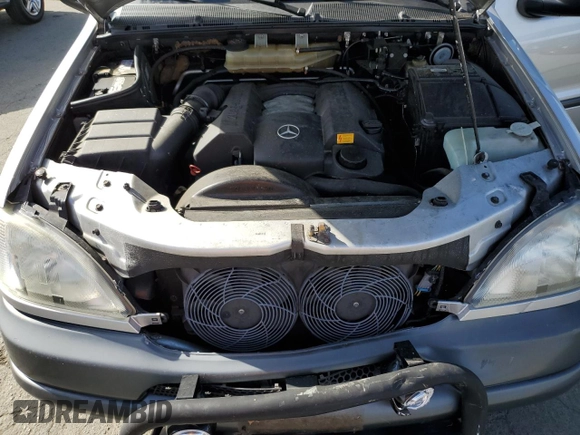 1999 Mercedes-Benz M-Class with VIN 4JGAB54E6XA078297, listed as a Copart auction lot 78088564 with 208,288 mi miles and Salvage Title. Bid and sale history available at carsss.com. Image 12.