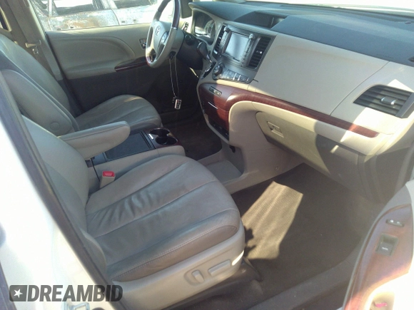 2014 Toyota Sienna XLE with VIN 5TDYK3DC3ES491381, listed as a IAAI auction lot 41803362 with 253,940 mi miles. Bid and sale history available at carsss.com. Image 5.