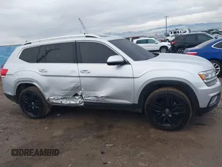 2018 Volkswagen Atlas SEL Premium with VIN 1V2NR2CA8JC575425, listed as a IAAI auction lot 41104744 with 62,774 mi miles and . Bid and sale history available at DreamBid. Image 14.