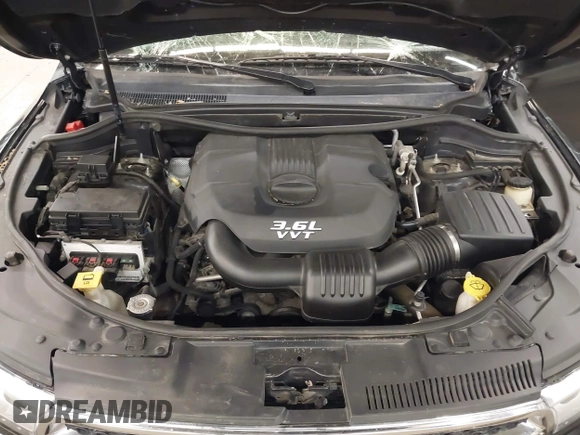 2013 Dodge Durango SXT with VIN 1C4RDJAG0DC512293, listed as a IAAI auction lot 41875919 with 191,128 mi miles and . Bid and sale history available at DreamBid. Image 10.