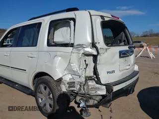 2015 Honda Pilot Touring with VIN 5FNYF3H97FB023842, listed as a IAAI auction lot 41673881 with 106,110 mi miles. Bid and sale history available at carsss.com. Image 6.