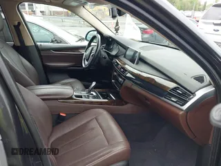 2015 BMW X5 xDrive35i z VIN 5UXKR0C59F0K55226, wystawiony jako IAAI lot #41952931 z przebiegiem 156 655 mil mil oraz . Historia ofert i sprzedaży dostępna na DreamBid. Obrazek 5.