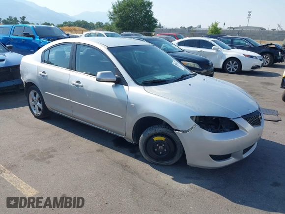 2006 Mazda Mazda3 i with VIN JM1BK12G861534885, listed as a IAAI auction lot 39860656 with 203,722 mi miles. Bid and sale history available at carsss.com. Image 1.