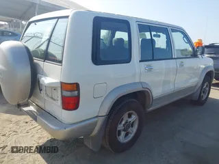 1999 Isuzu Trooper S with VIN JACDJ58X7X7926697, listed as a IAAI auction lot 42654076 with 62,672 mi miles and . Bid and sale history available at DreamBid. Image 4.