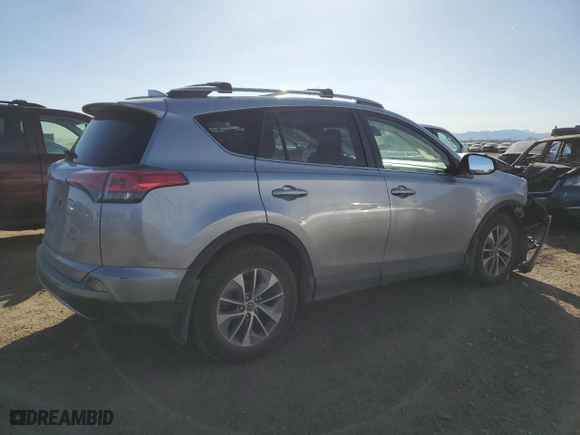 2017 Toyota RAV4 Hybrid XLE with VIN JTMRJREV0HD124707, listed as a Copart auction lot 48736145 with 48,491 mi miles and Salvage Title. Bid and sale history available at carsss.com. Image 3.