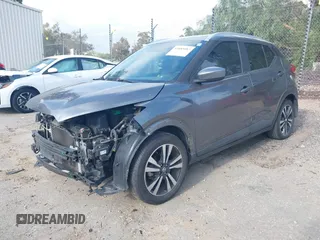 2019 Nissan Kicks SR with VIN 3N1CP5CU9KL483310, listed as a IAAI auction lot 41885087 with 128,055 mi miles. Bid and sale history available at carsss.com. Image 2.