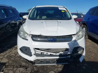 2016 Ford Escape SE with VIN 1FMCU0G97GUA80692, listed as a IAAI auction lot 41860124 with 122,251 mi miles. Bid and sale history available at carsss.com. Image 6.