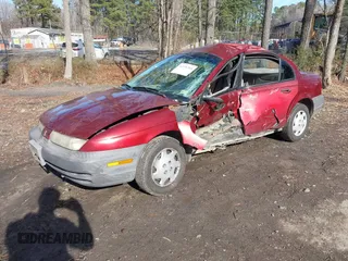 1997 Saturn SL with VIN 1G8ZF528XVZ325466, listed as a IAAI auction lot 41576703 with 237,089 mi miles. Bid and sale history available at carsss.com. Image 17.