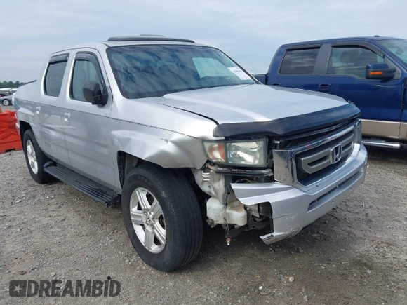 2009 Honda Ridgeline RTL with VIN 2HJYK16539H500986, listed as a IAAI auction lot 42084176 with 161,142 mi miles and . Bid and sale history available at DreamBid. Image 1.