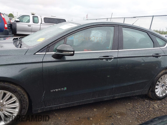 2015 Ford Fusion SE Hybrid with VIN 3FA6P0LU9FR184907, listed as a IAAI auction lot 42119737 with 153,255 mi miles and . Bid and sale history available at DreamBid. Image 15.